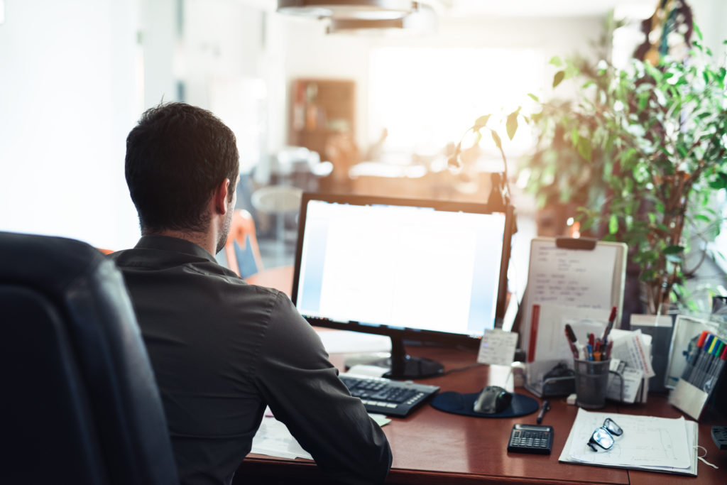 man at computer